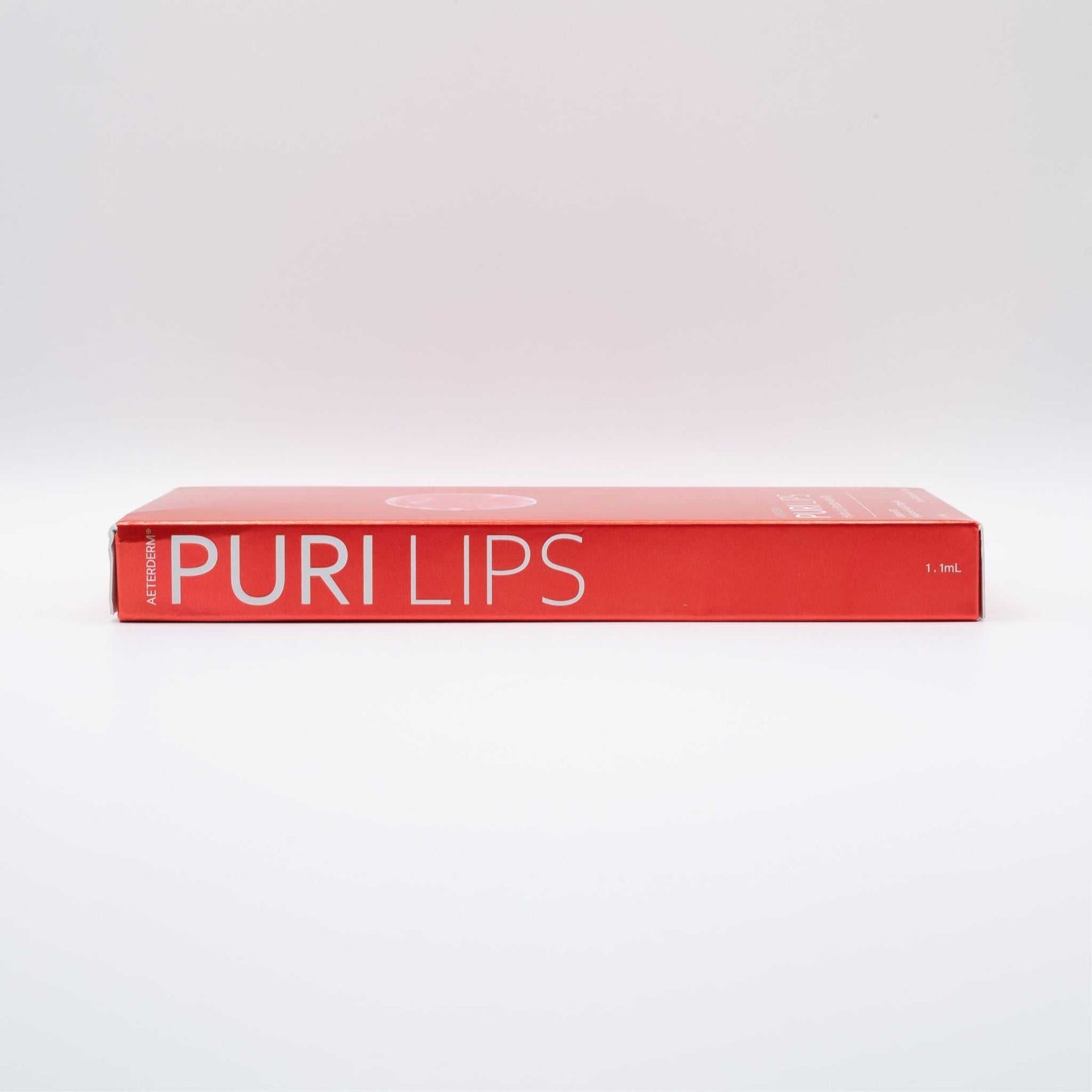 Puri Lips Hydro Lip Booster box with red and white packaging for semi-permanent lip tint and hydration