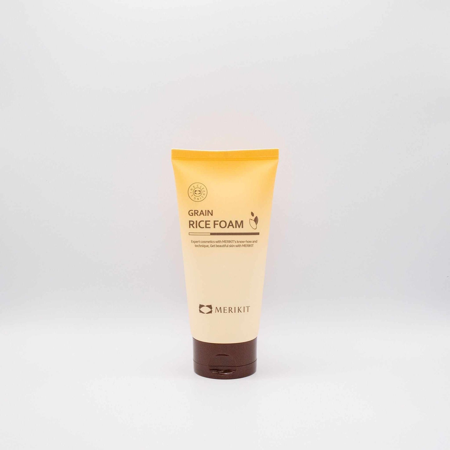 Merikit Grain Rice Foam cleanser tube with yellow and brown packaging on white background