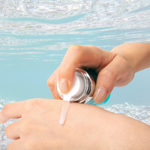 Applying VITARAN Exosome PDRN Dual Serum to skin, skincare product, salmon DNA formula.