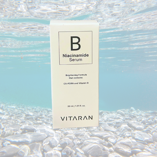 VITARAN B Salmon DNA and Niacinamide Serum 30ml brightening ampoule under water.